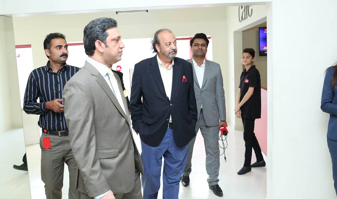Mr. Agha Siraj Durrani is taking a tour of BOL House and is being briefed about the facilitites offered at BOL.